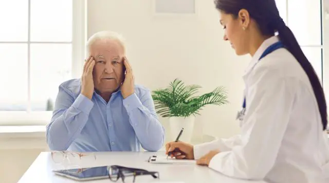Pain Management Physicians consulting a patient