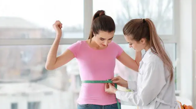 Patient reviewing her Weight Loss Programs